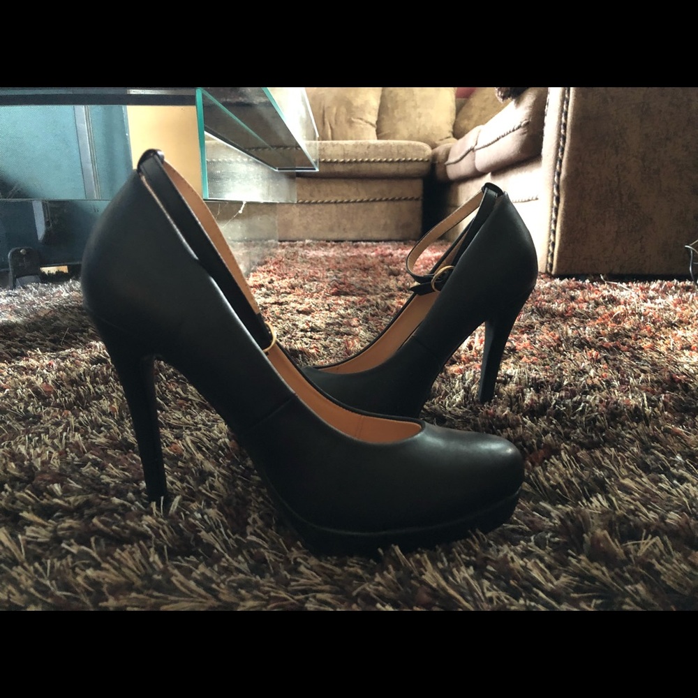 Brand new, black, 4” platform heels